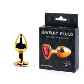 Золотистая анальная пробка с малиновым кристаллом-сердечком - 7 см. - Anal Jewelry Plug - купить с доставкой в Нижнекамске